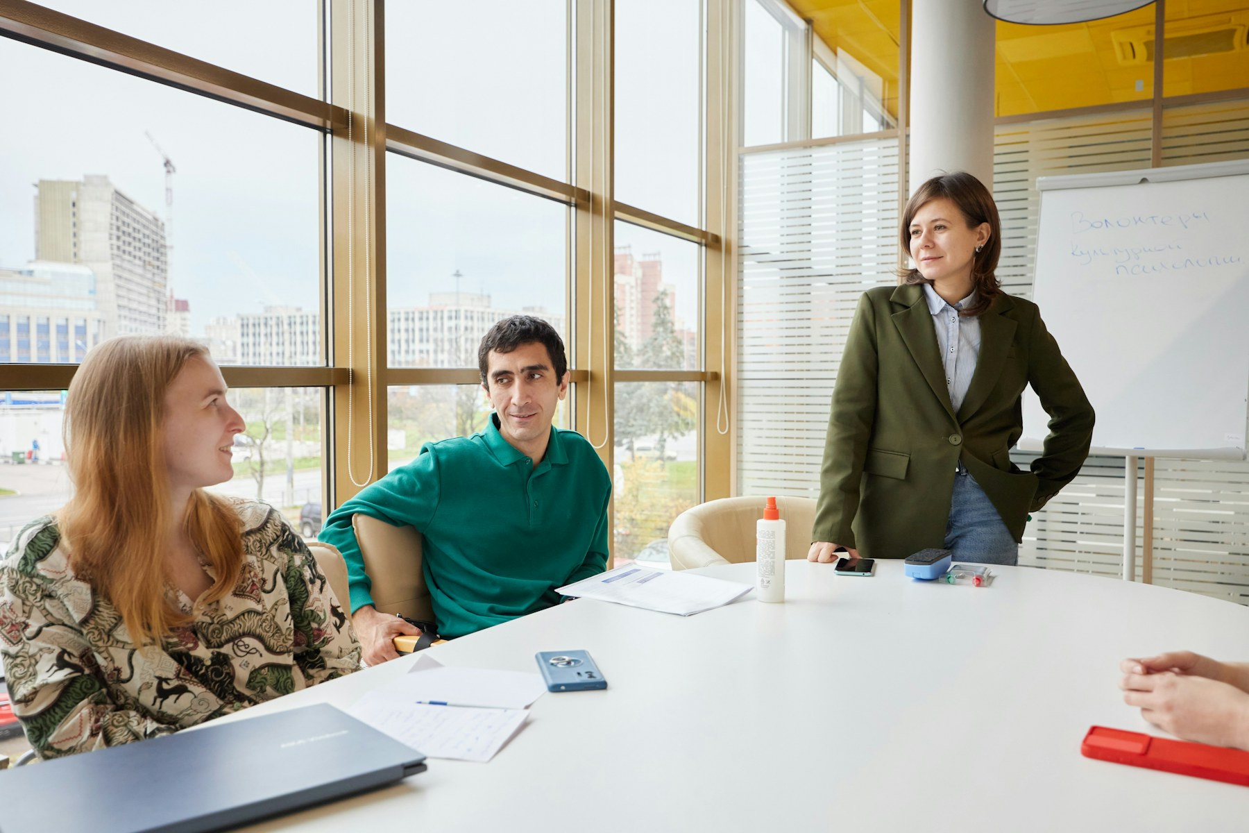 Professionals collaborating around a conference table